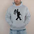 Patriotic Bigfoot Sweatshirt - Sasquatch Carrying American Flag Hoodie *UNISEX FIT*-Sweatshirts-208 Tees Wholesale, Idaho