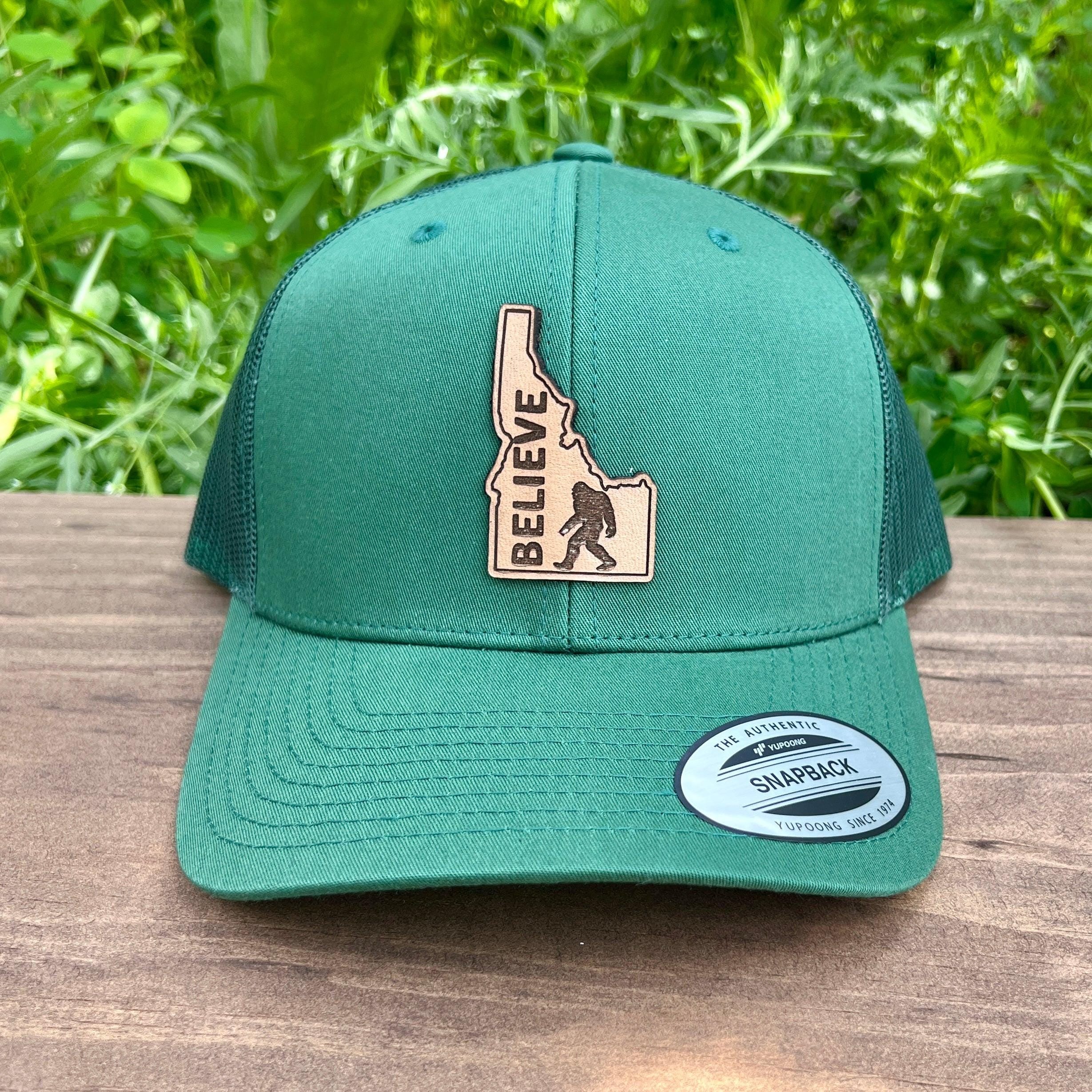 Bigfoot Idaho Hat Trucker Cap: Sasquatch Forest Theme, Leather Mesh Construction (Adjustable Snapback, Breathable Fit)-208 Tees Wholesale, Idaho