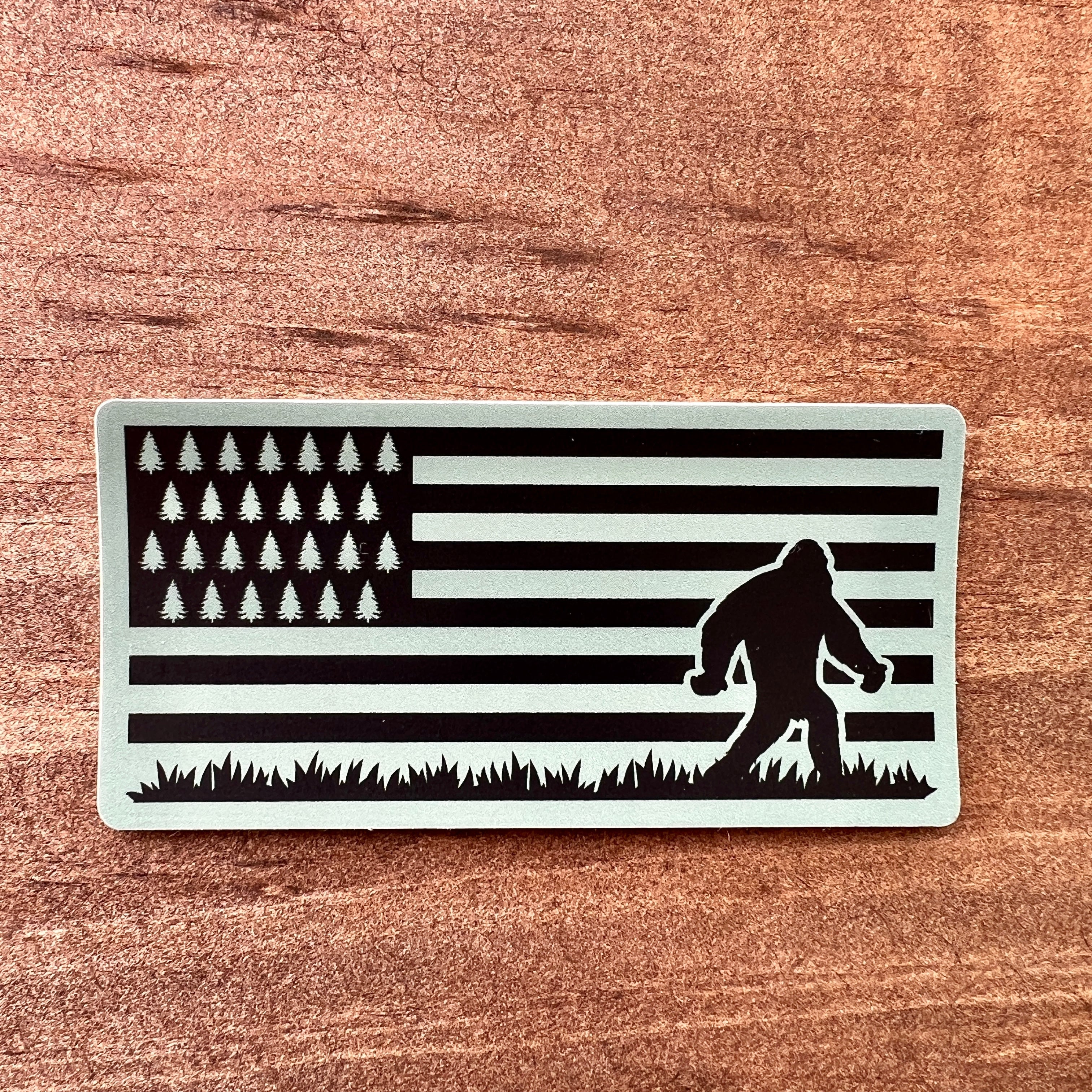 Bigfoot in Flag Sticker-Sticker-208 Tees- 208 Tees, A Women's, Men's and Kids Online Graphic Tee Boutique, Located in Spirit Lake, Idaho